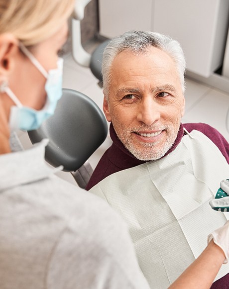 Patient having a dental impression taken