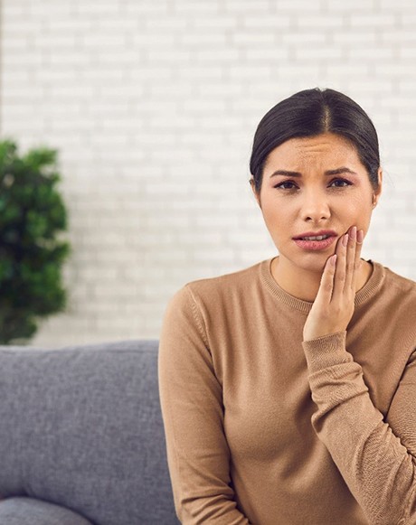 Woman experiencing tooth pain