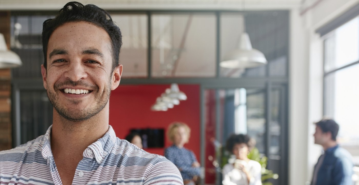 Man with healthy smile after gum disease treatment