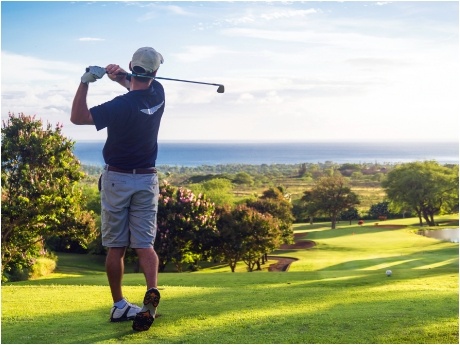 Person golfing