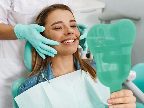 patient smiling during checkup